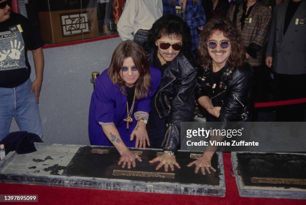 British singer and songwriter Ozzy Osbourne, British guitarist Tony Iommi, and British musician and songwriter Geezer Butler, of the original line-up...