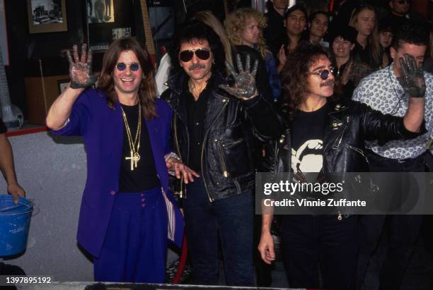 British singer and songwriter Ozzy Osbourne, British guitarist Tony Iommi, and British musician and songwriter Geezer Butler, of the original line-up...