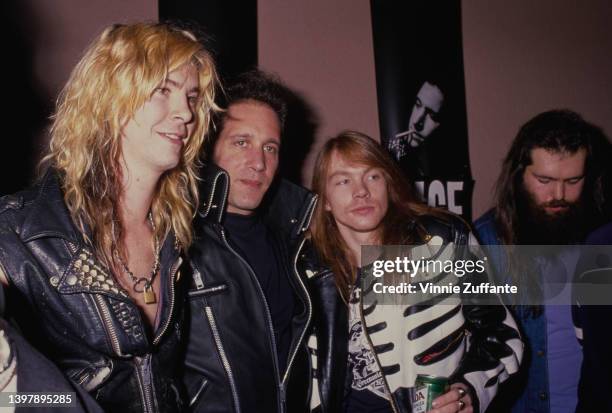 American guitarist and songwriter Duff McKagan, American comedian Andrew Dice Clay, American singer-songwriter Axl Rose, wearing a black leather...