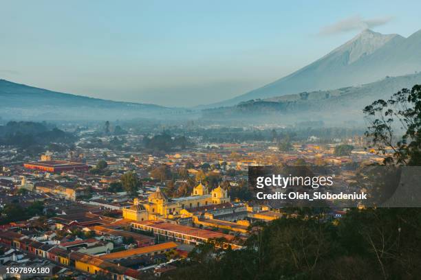scenic view of antigua at sunrise - guatemala city bildbanksfoton och bilder