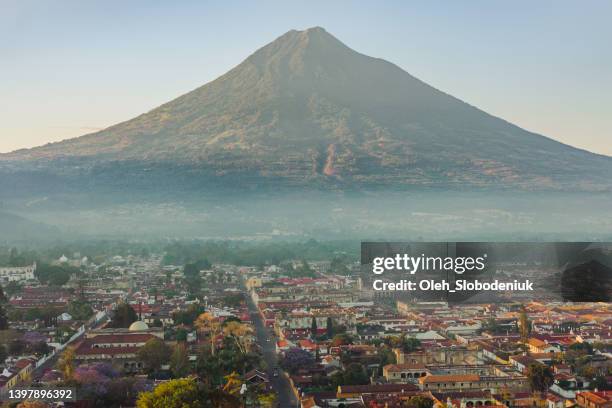 scenic view of antigua at sunrise - guatemala city skyline stock pictures, royalty-free photos & images