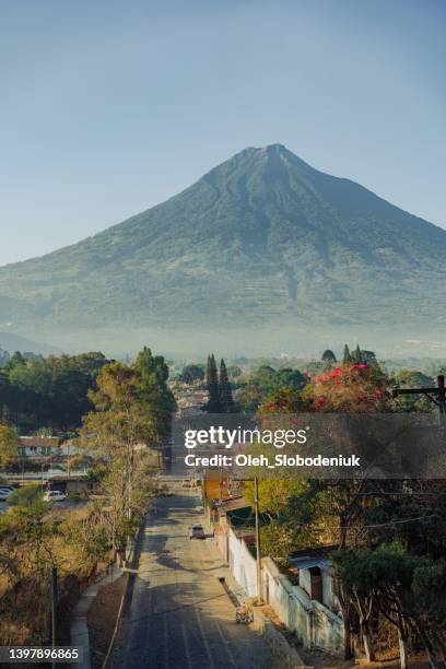 scenic view of antigua at sunrise - agua stock pictures, royalty-free photos & images