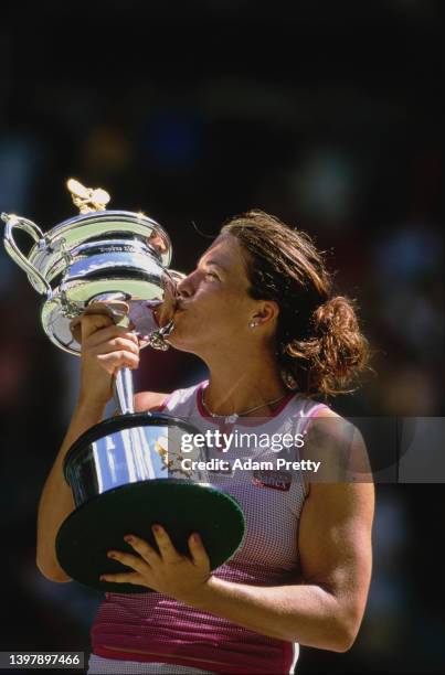 Jennifer Capriati from the United States kisses the Daphne Akhurst Memorial Cup after defeating Martina Hingis of Switzerland in the Women's Singles...