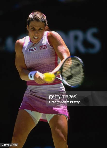 Jennifer Capriati from the United States plays a double handed backhand return to Amélie Mauresmo of France during their Women's Singles Quarter...