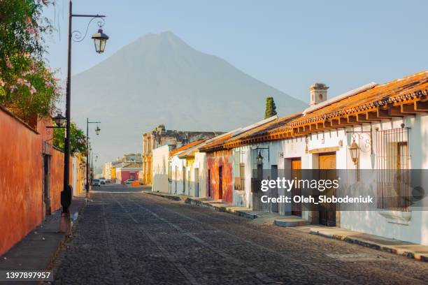 scenic view of antigua at sunrise - antigua guatemala stock pictures, royalty-free photos & images