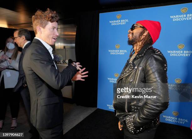 Shaun White, Shaun White docuseries on discovery+ and Lil Jon, Lil Jon Wants To Do What?, HGTV pose in the Warner Bros. Discovery Upfront 2022 green...
