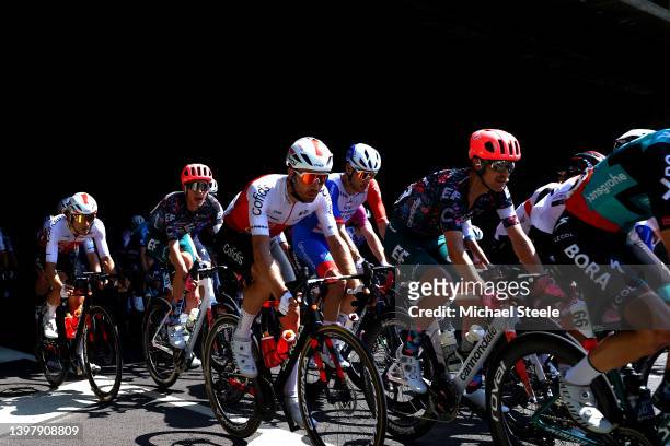 Guillaume Martin of France and Team Cofidis, Hugh Carthy of United Kingdom and Team EF Education - Easypost, Pierre-Luc Perichon of France and Team...