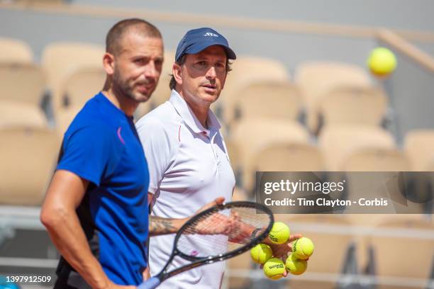 May 18. Daniel Evans of Great Britain with coach Sebastian Prieto while training on Court Philippe Chatrier in preparation for the 2022 French Open...