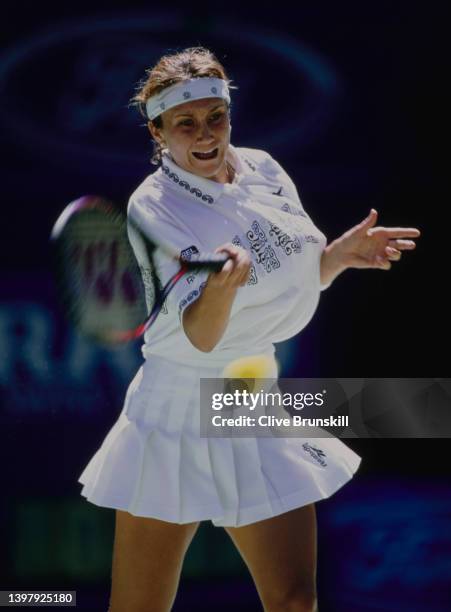 Iva Majoli from Croatia plays a forehand return to Monica Seles of the United States during their Women's Singles Quarter Final match at the...