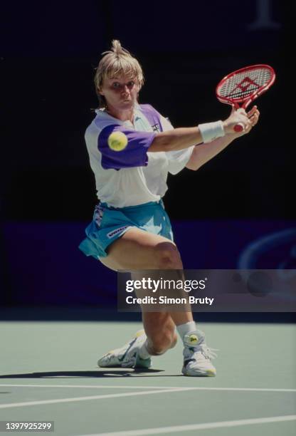 Jana Novotná from Czechoslovakia plays a backhand return to Monica Seles of Yugoslavia during their Women's Singles Final match at the Australian...