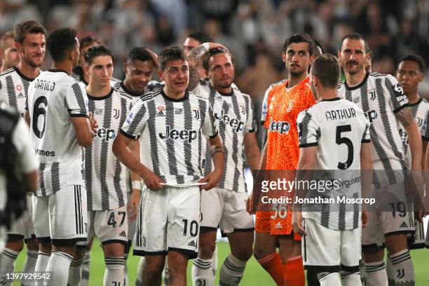 An emotional Paulo Dybala of Juventus cries with team mates following the final whistle of his last home game for Juventus at the Serie A match...