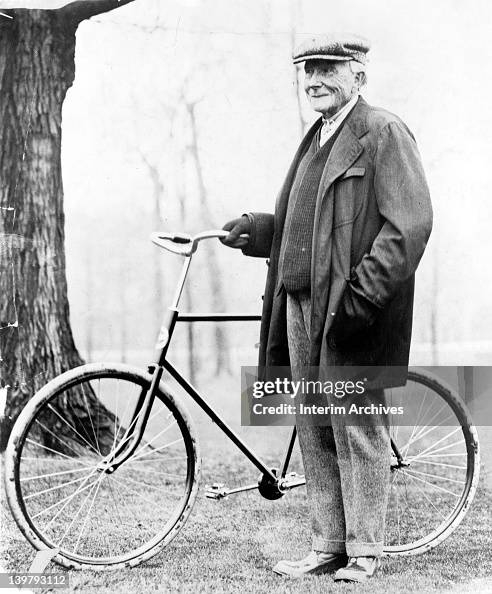 John D Roc Full length portrait of John D. Rockefeller standing next to a... News ...
