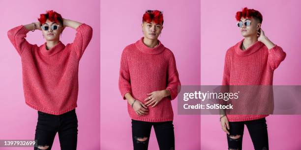 expressing himself - red and pink outfit stock pictures, royalty-free photos & images