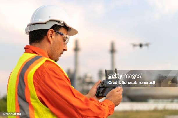 drone pilot engineer cctv or industrial monitoring - drone pilot stock pictures, royalty-free photos & images