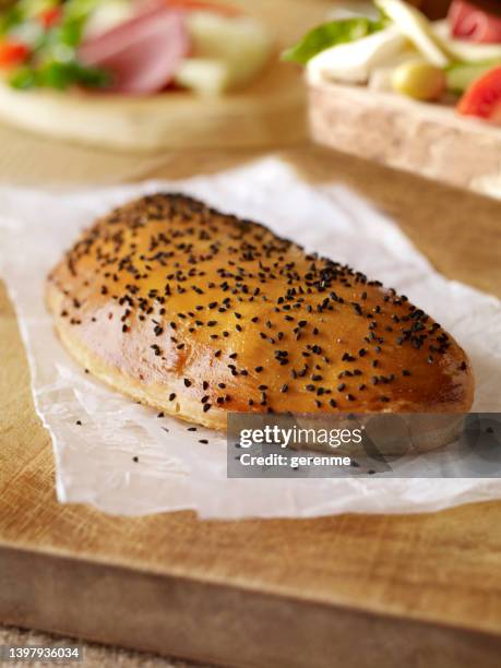 calzone - sesam stock-fotos und bilder