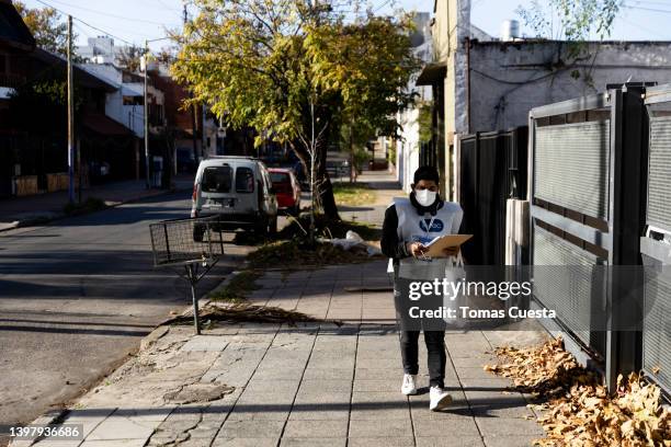 Guillermo Vivas walks as working on the 2022 national census on May 18, 2022 in San Martin, Buenos Aires Province, Argentina. After a two-year delay...