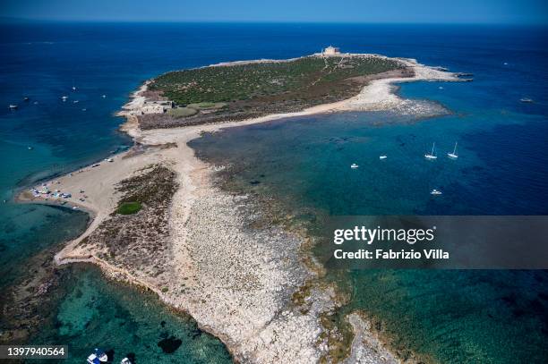 Aerial view, from helicopter, Capo Passero Island, in the province of Siracusa in Sicily on August 11, 2019 in Portopalo Di Capo Passero, Italy....