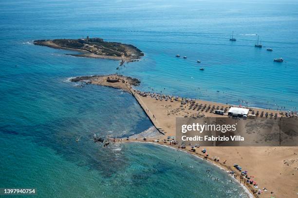 Aerial view, from a helicopter, Isola delle Correnti is the southernmost point of Sicily. It is a small rocky island covering some 10,000 square...