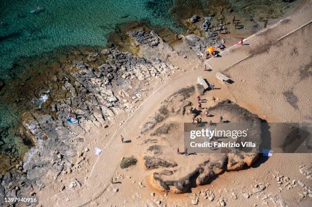 Aerial view, from a helicopter, Isola delle Correnti is the southernmost point of Sicily. It is a small rocky island covering some 10,000 square...
