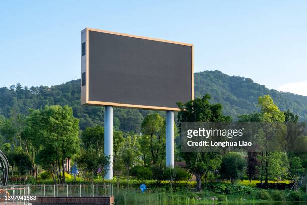 outdoor large electronic billboard - office placard stock pictures, royalty-free photos & images