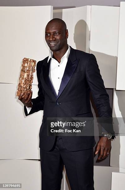 Omar Sy poses after receiving the Cesar Award for Best Actor during the 37th Cesar Film Awards at Theatre du Chatelet on February 24, 2012 in Paris,...