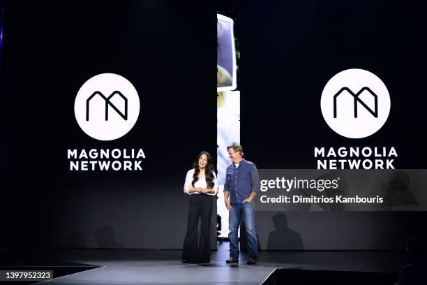 Joanna Gaines and Chip Gaines, Fixer Upper on Magnolia speak onstage during the Warner Bros. Discovery Upfront 2022 show at The Theater at Madison...