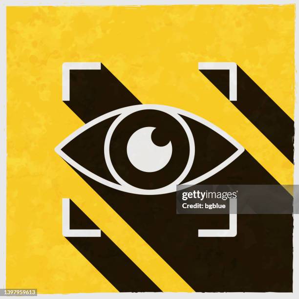 retinal scan. icon with long shadow on textured yellow background - scan texture stock illustrations