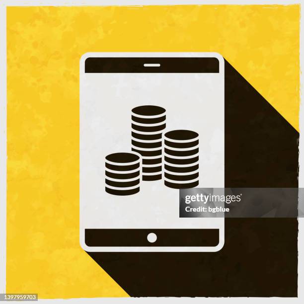 tablet pc with stack of coins. icon with long shadow on textured yellow background - computer gaming background stock illustrations