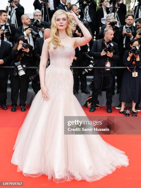 Elle Fanning attends the screening of "Top Gun: Maverick" during the 75th annual Cannes film festival at Palais des Festivals on May 18, 2022 in...