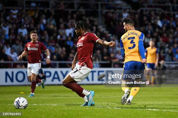 Stephen McLaughlin of Mansfield Town scores their team's first goal during the Sky Bet League Two Play-off Semi Final 2nd Leg match between...