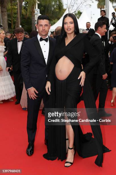 Andre Lemmers and Adriana Lima attend the screening of "Top Gun: Maverick" during the 75th annual Cannes film festival at Palais des Festivals on May...
