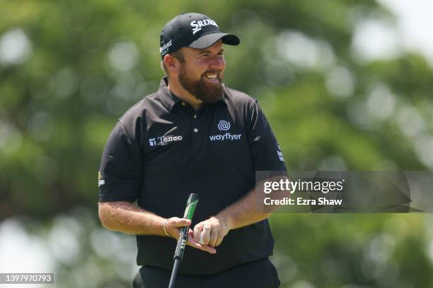 Shane Lowry of Ireland reacts on the course during a practice round prior to the start of the 2022 PGA Championship at Southern Hills Country Club on...