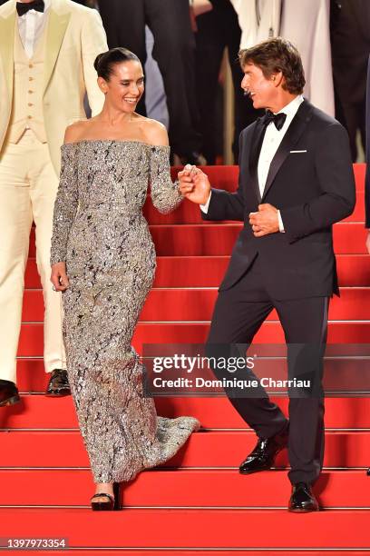 Jennifer Connelly and Tom Cruise leave the screening of "Top Gun: Maverick" during the 75th annual Cannes film festival at Palais des Festivals on...