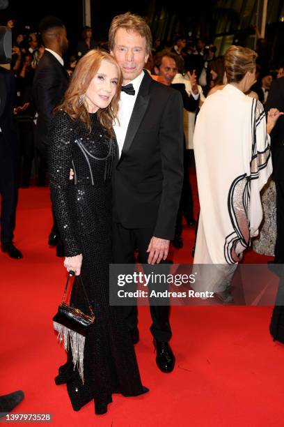 Linda Bruckheimer and Jerry Bruckheimer leave the screening of "Top Gun: Maverick" during the 75th annual Cannes film festival at Palais des...