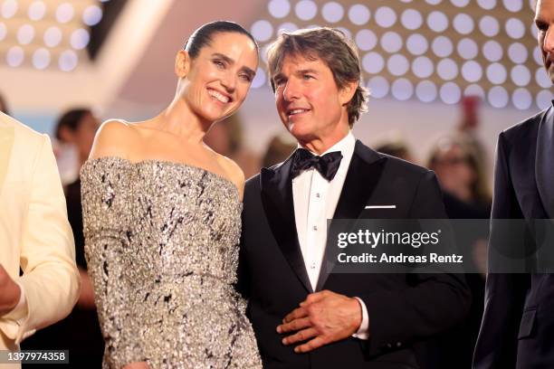 Jennifer Connelly and Tom Cruise leave the screening of "Top Gun: Maverick" during the 75th annual Cannes film festival at Palais des Festivals on...