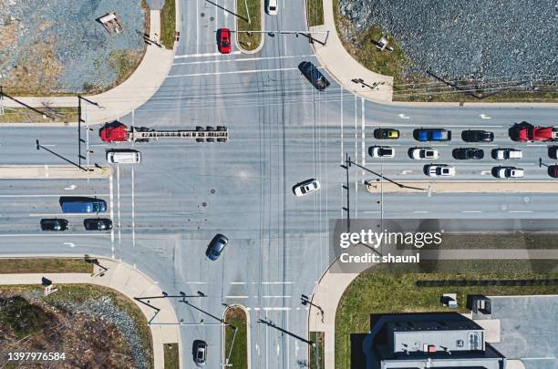 aerial view of intersection - aerial surveillance stock pictures, royalty-free photos & images