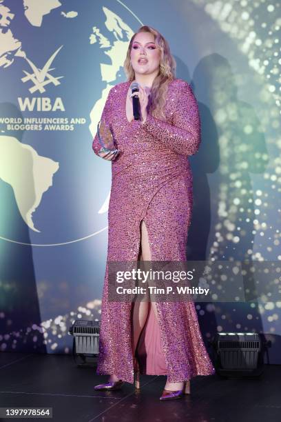 Award winner Nikkie de Jager AKA Nikkie Tutorials speaks on stage during the World Influencers and Bloggers Awards 2022 at Hotel Martinez on May 18,...