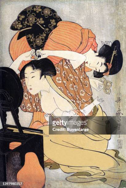 Mother breastfeeding a baby. Kitagawa Utamaro was a Japanese artist. He is one of the most highly regarded designers of ukiyo-e woodblock prints and...