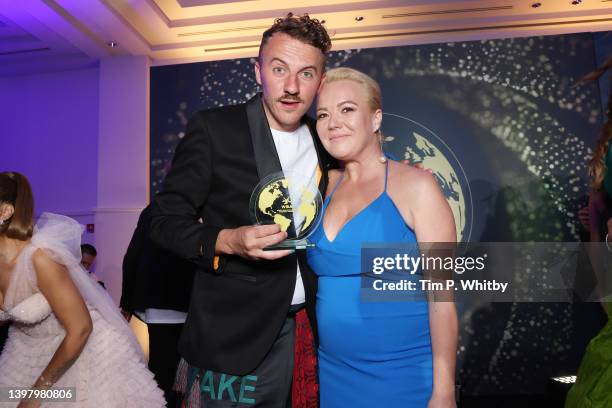 Award winner Ievgen Klopotenko poses with their award with Iryna Savchak at the World Influencers and Bloggers Awards 2022 at Hotel Martinez on May...