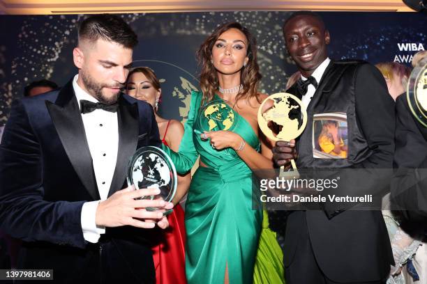 Award winners Riggio Alessandro, Madalina Ghenea and Khaby Lame pose with their awards at the World Influencers and Bloggers Awards 2022 at Hotel...
