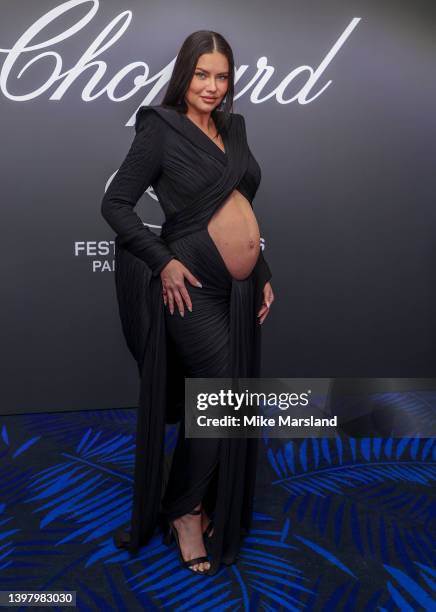 Adriana Lima attends the Chopard "Gentleman's Evening" during the 75th annual Cannes film festival at Rooftop Hotel Martinez on May 18, 2022 in...