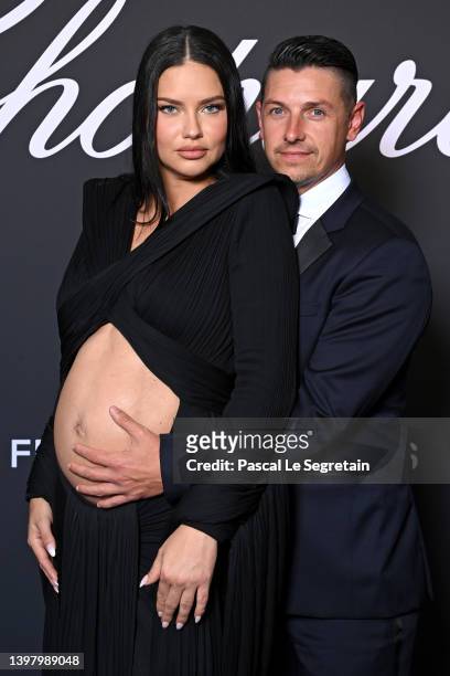 Adriana Lima and Andre Lemmers attend the Chopard "Gentleman's Evening" during the 75th annual Cannes film festival at Rooftop Hotel Martinez on May...