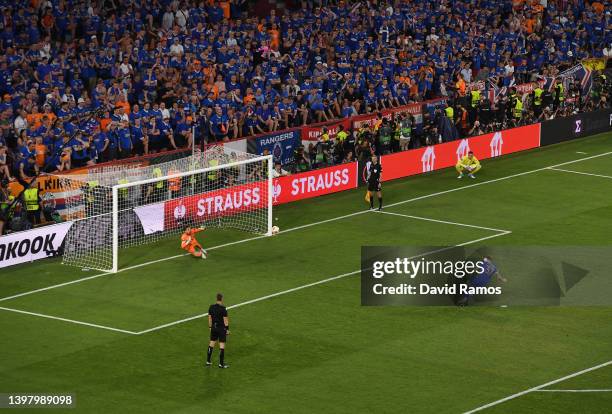 Scott Arfield of Rangers scores their team's third penalty in the penalty shoot out during the UEFA Europa League final match between Eintracht...
