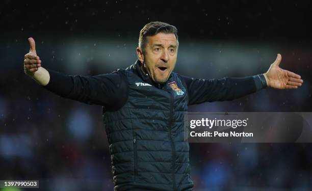 Northampton Town manager Jon Brady makes his point to Linesman Daniel Flynn after Stephen McLaughlin had scored Mansfield Town's goal during the Sky...