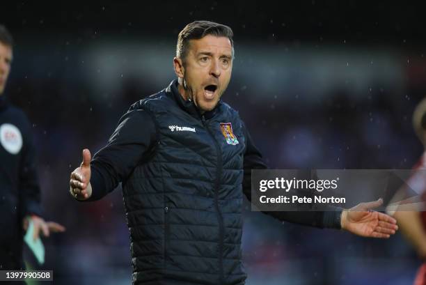 Northampton Town manager Jon Brady makes his point to Linesman Daniel Flynn after Stephen McLaughlin had scored Mansfield Town's goal during the Sky...