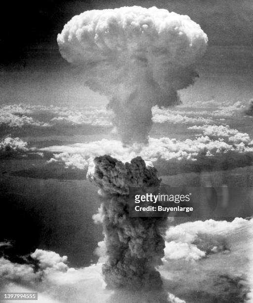 Atomic cloud rises over Nagasaki, Japan. Photographed by one of the bombers on the raid. Artist Charles Levy, 1945