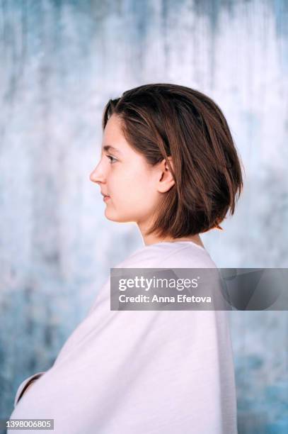 profile of young woman - woman profile stock pictures, royalty-free photos & images