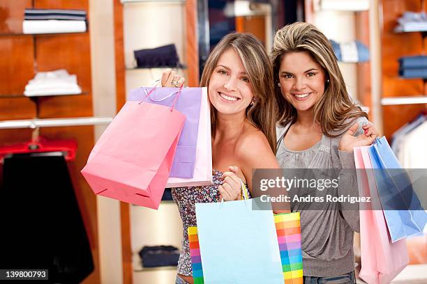 hispanic women shopping together - cundinamarca stock pictures, royalty-free photos & images