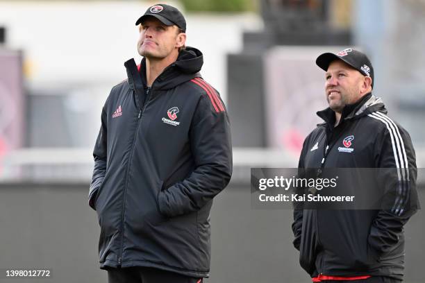 Head Coach Scott Robertson and Assistant Coach Jason Ryan look on during a Crusaders Super Rugby Pacific training session at Orangetheory Stadium on...