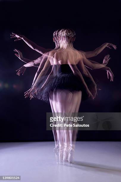 caucasian ballerina dancing on stage - long exposure dance stock pictures, royalty-free photos & images